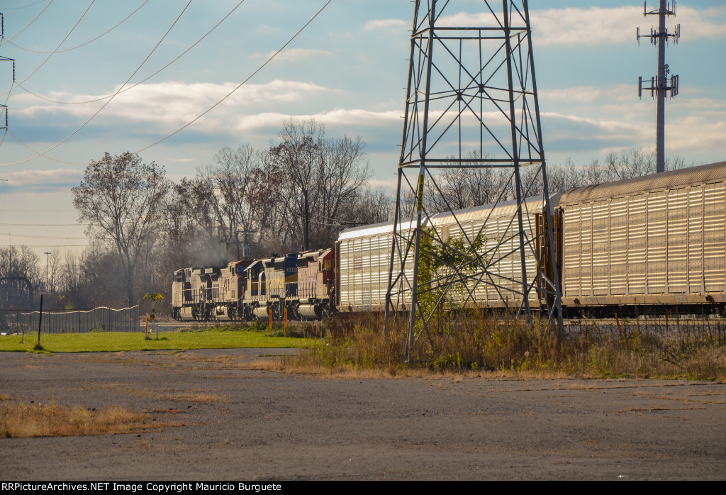 CP AC44CW + SD40-2 Locomotives leading a train